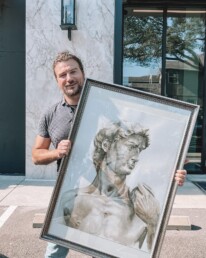 A stunning watercolor triptych of Michelangelo's famous statue of David, displayed in Priano, Tampa Florida.