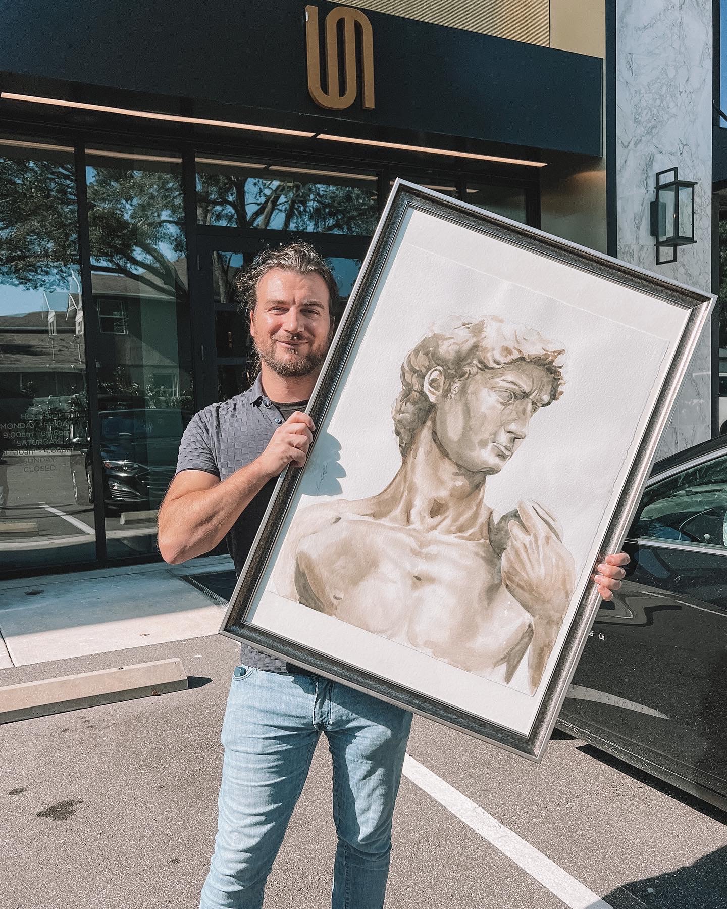 A breathtaking watercolor triptych of Michelangelo's famous statue of David, now on display at Priano in Tampa, Florida.