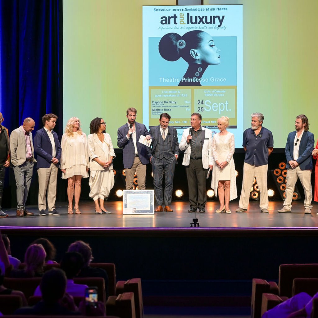 _DSC7742 1 Alex Righetto on stage at Art & Luxury Monaco 2026 with Princess Margherita de Bourbon de Parme and event organizer Annette at the Théâtre Princesse Grace.